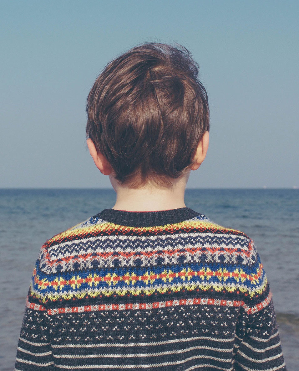 Child Looking at the Ocean